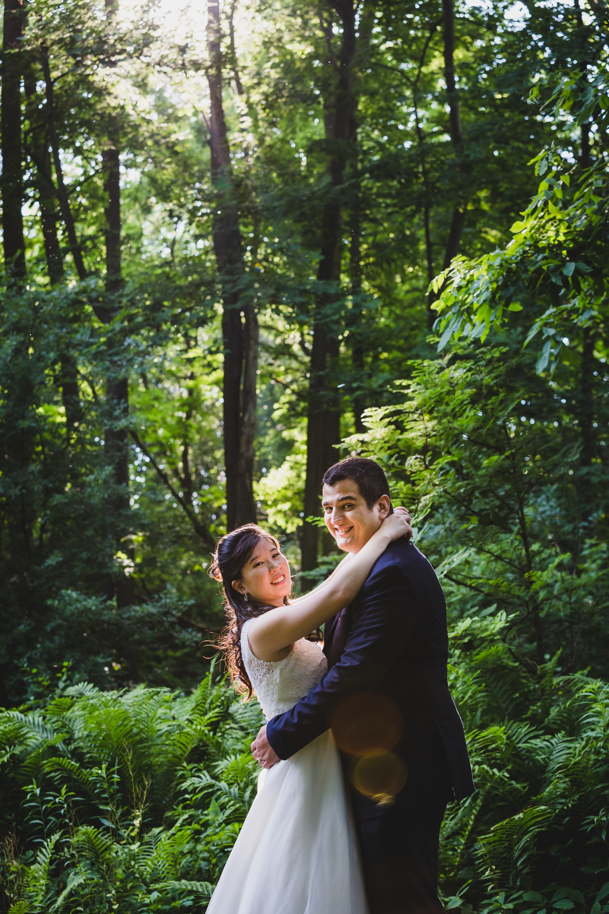 Riverbend Golf Club wedding pose on the woods